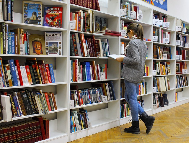 young woman browsing in a book store